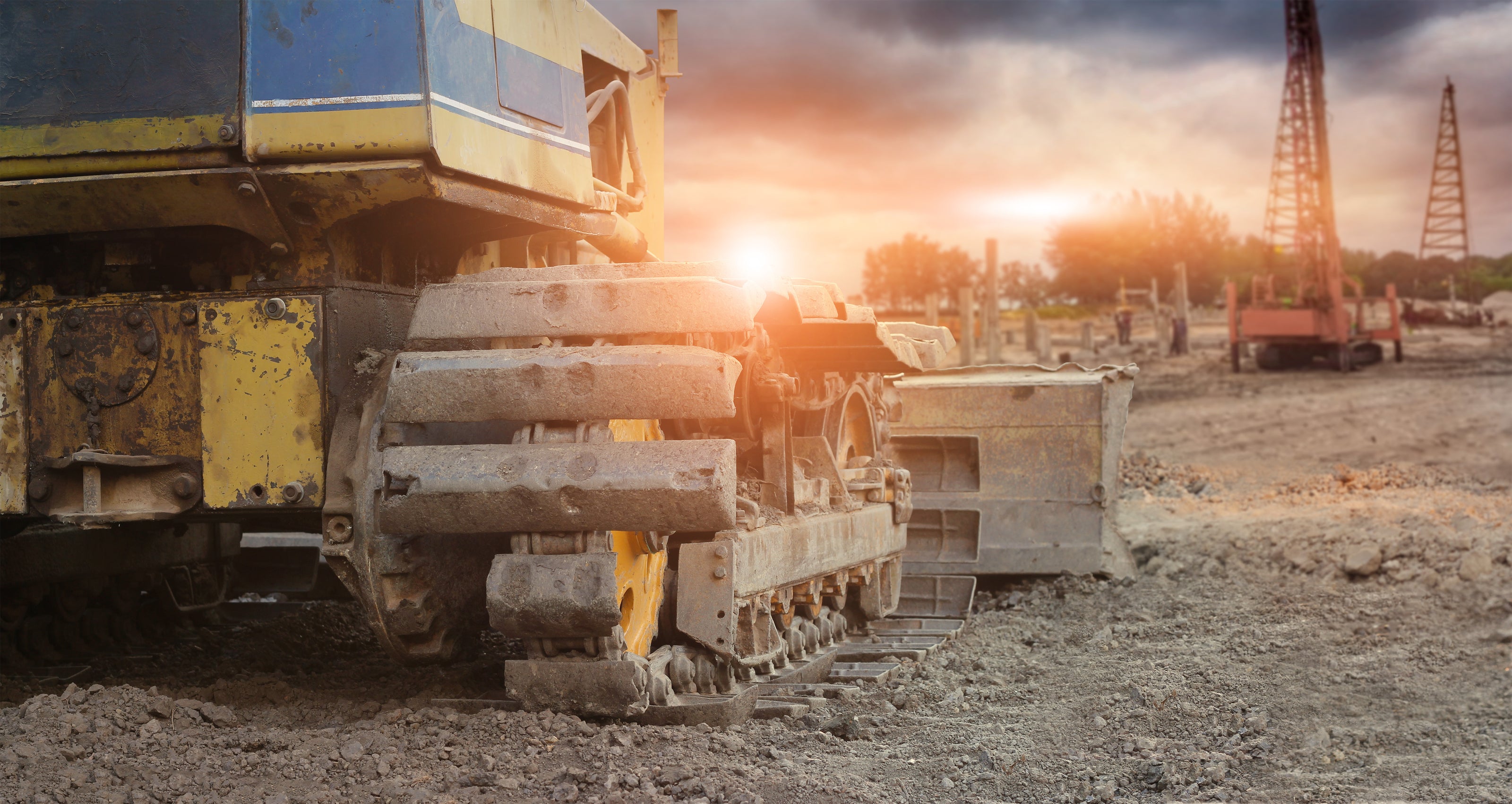 Excavator on a construction job site at golden hour